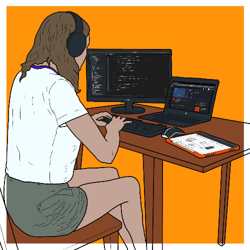 Lowri Roberts working at her desk